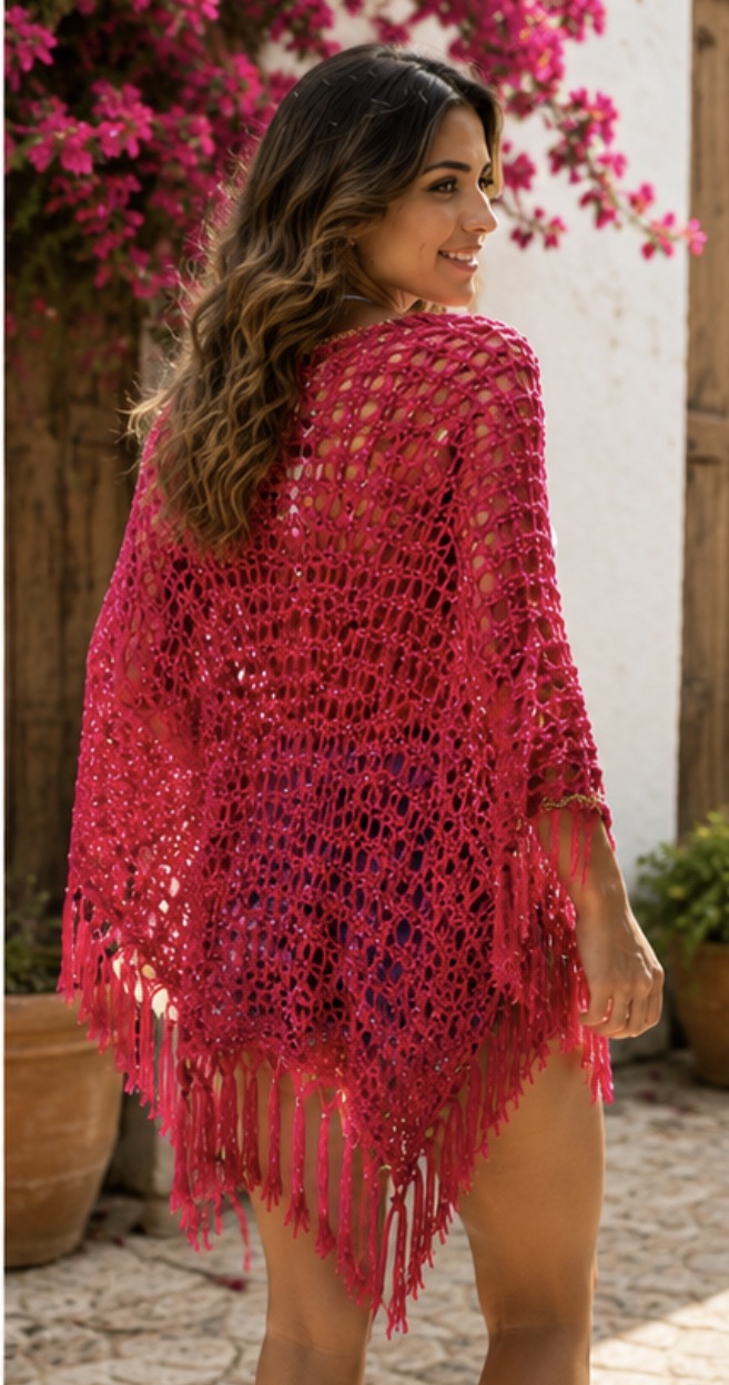 Chal fucsia artesanal de crochet con flecos – estilo boho ibicenco